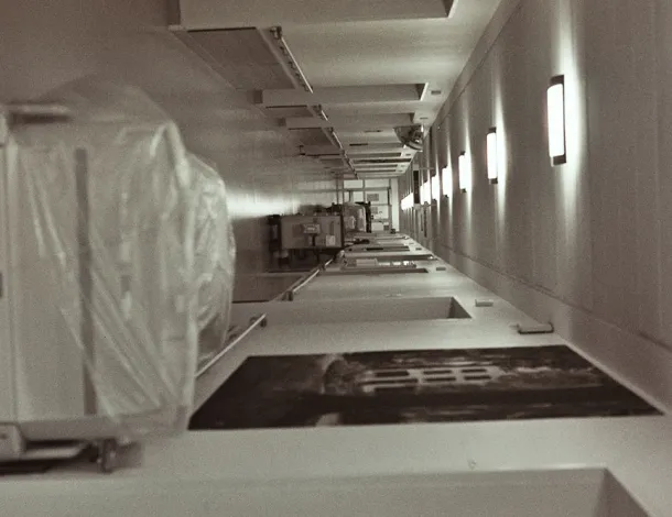 Photo of a hospital corridor, rotated 90 degrees clockwise