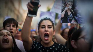 Woman protesting in Madrid