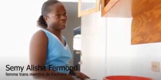 A woman indoors with overlaid text saying, “Semi Alisha Fermond” and “Femme trans membre de Kaytrans Ayiti”